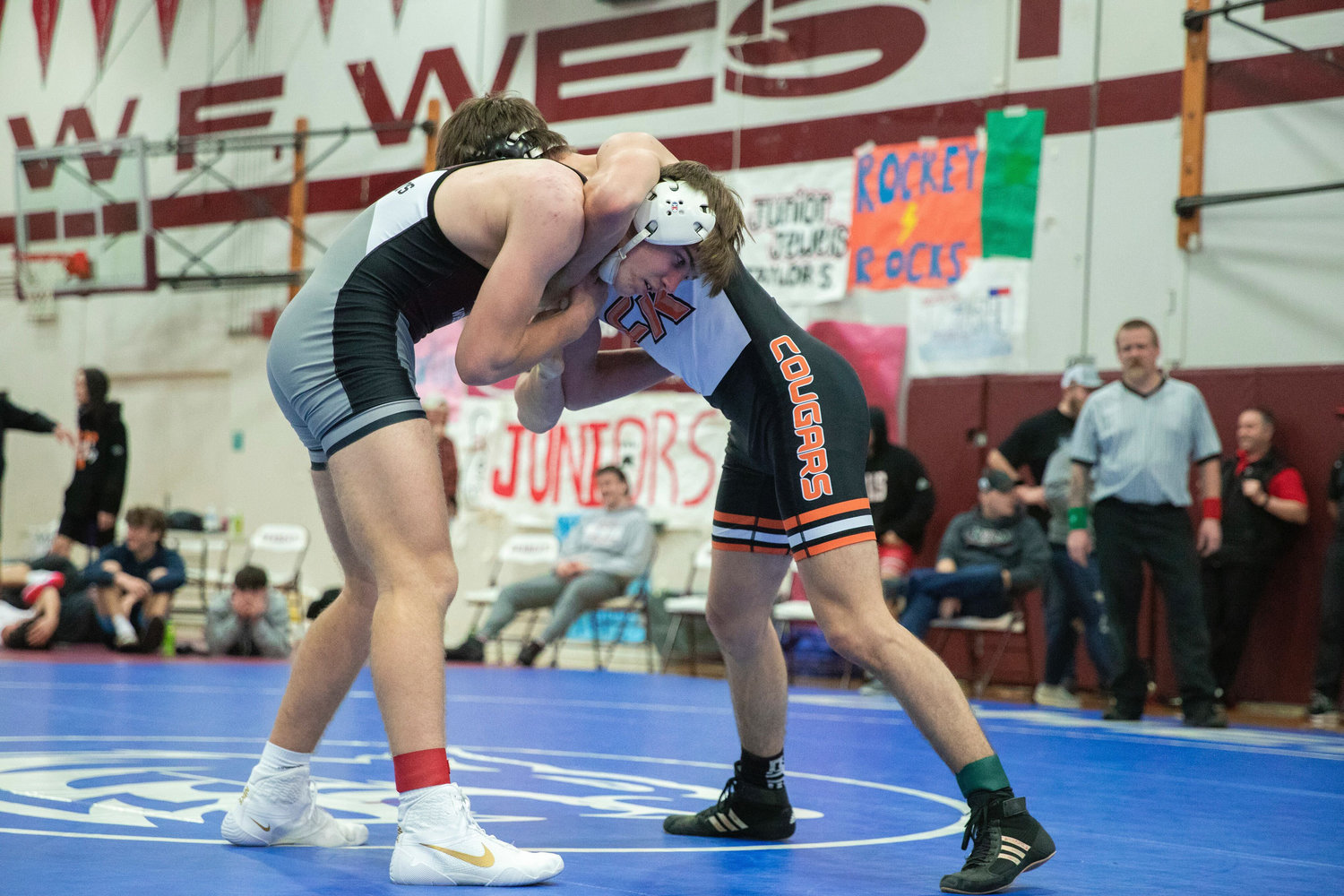 W.F. West’s Tucker Land wrestles Coke Erickson from Central Kitsap at 170 pounds during the Bearcat Invitational on Saturday in Chehalis.